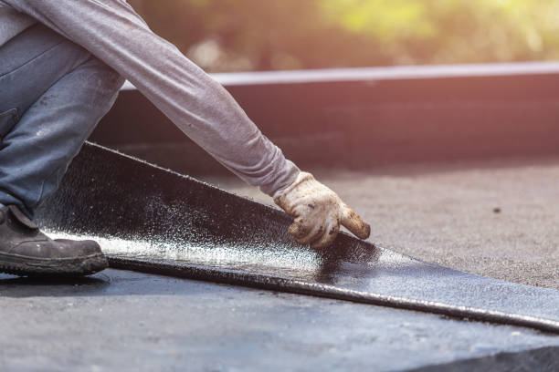 Professional Basement Waterproofing technician working in Springville, IN
